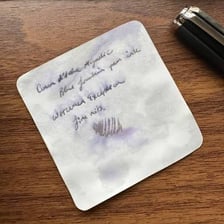 Handwriting being made with a ballpoint pen on paper