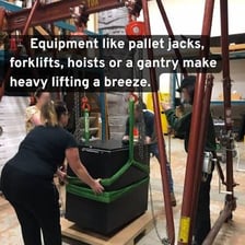 A heavy object being raised with lifting equipment