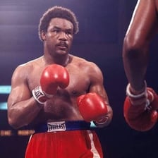 A portrait of boxer and entrepreneur George Foreman
