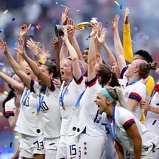 A victorious sports team celebrating after decisively defeating its opponent