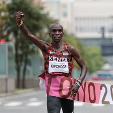 A Kenyan distance runner competing in a marathon