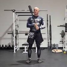 An athlete performs repetitions during a strength-training workout.