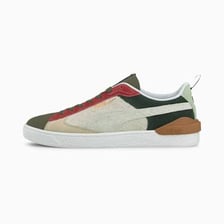 A Puma sneaker showing the curved Formstrip on its side.