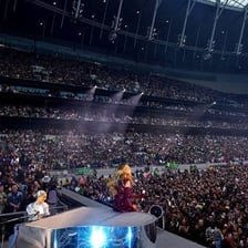 A large crowd of Beyoncé fans at a concert.