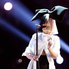 Singer Sia performing on stage.