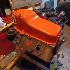 Cooking pan, oil pump, and oil paint shown as related objects