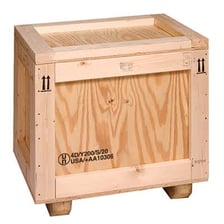 A wooden shipping crate with an upward-arrow handling mark