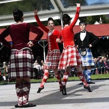A group gathered to represent a traditional clan.