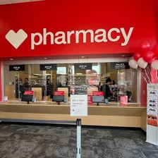 A CVS Pharmacy storefront with its recognizable sign.