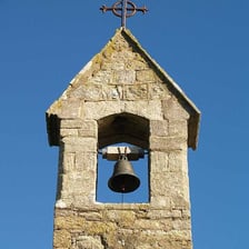 Bells hanging in a church tower.