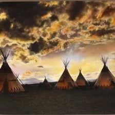 A traditional conical tepee at an outdoor camp