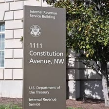 A sign identifying an Internal Revenue Service office.