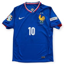 French national soccer players wearing blue jerseys