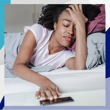 A person lying in bed in the morning