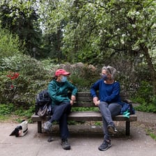 People wearing protective face masks in a public place.