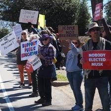 A person visibly expressing anger or outrage