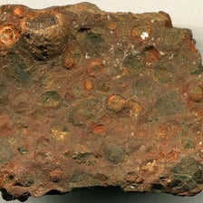 Rock samples containing visible metallic ore.