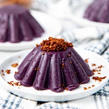 Purple ube yam beside a Filipino dessert.