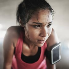 Person sweating heavily while running