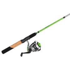 A fishing rod with a reel beside a lake