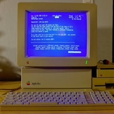 A vintage computer display showing a text-based Usenet newsgroup interface.