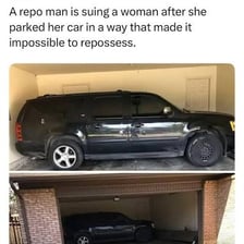 A tow truck lifting a car for repossession.