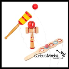 A wooden cup-and-ball toy beside a yo-yo