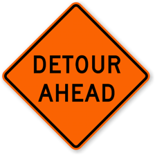 Traffic being redirected along a detour.