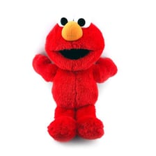 A red Tickle Me Elmo plush toy