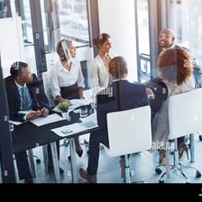 A person participating in a group planning discussion.