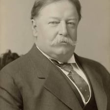 A historical portrait of William Howard Taft in judicial attire.