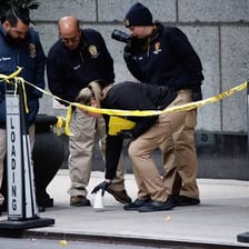A police officer investigating a suspected crime