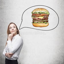 A person looking eagerly at something they desire.