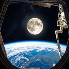 The Moon seen in space with Earth below