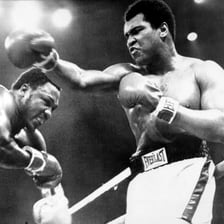 A boxing match showing a decisive punch.