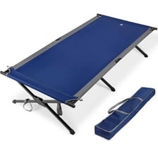Several folding cots arranged in a sleeping area