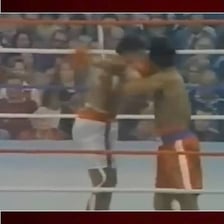Two boxers exchanging powerful punches in a ring