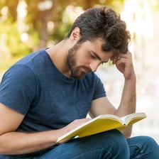 A person reading a book.