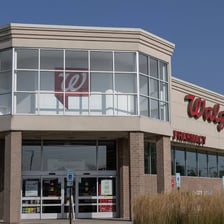 A Walgreens pharmacy storefront with its recognizable sign