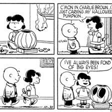 A Peanuts comic-strip panel featuring Charlie Brown and Snoopy.