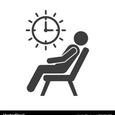 A person waiting patiently beside a clock.