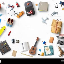 Miscellaneous objects scattered messily across a floor