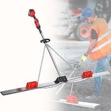 A worker using a tool to make a surface level