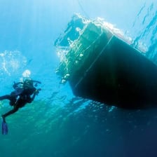 The submerged hull of a boat.