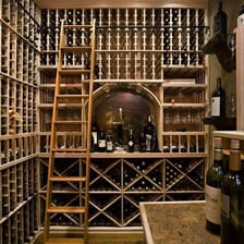 Bottles of wine aging in a cellar
