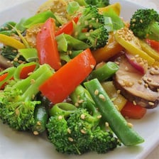 A wok being used to cook a stir-fry.