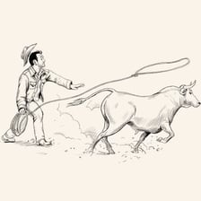 A cowboy swinging a lasso.
