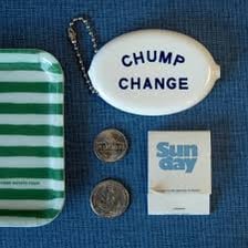 A small amount of loose change on a surface