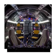 Han Solo in the cockpit of the Millennium Falcon