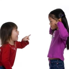 Two children protesting during an argument